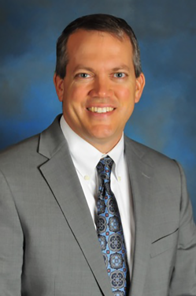 Dr. Tom Merrill